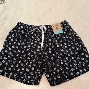 chubbies Navy Swim Trunks with White Floral Print